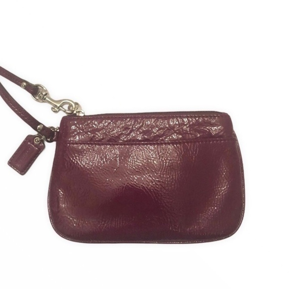 Coach purple patent leather wristlet clutch bag